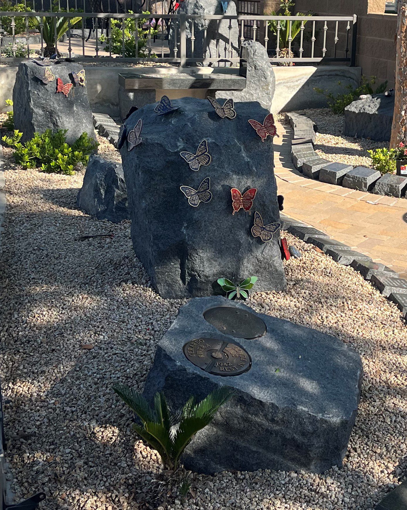 Cremation boulder with bronze butterflies