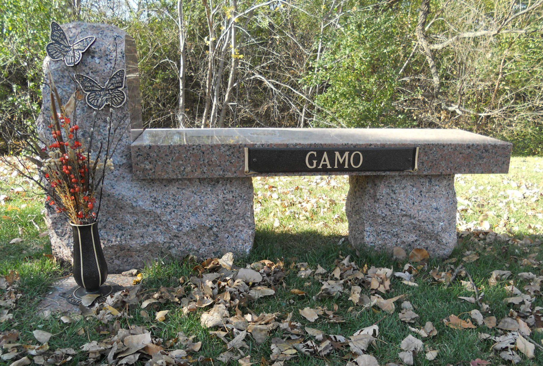 Cremation memorial bench with bronze butterflies